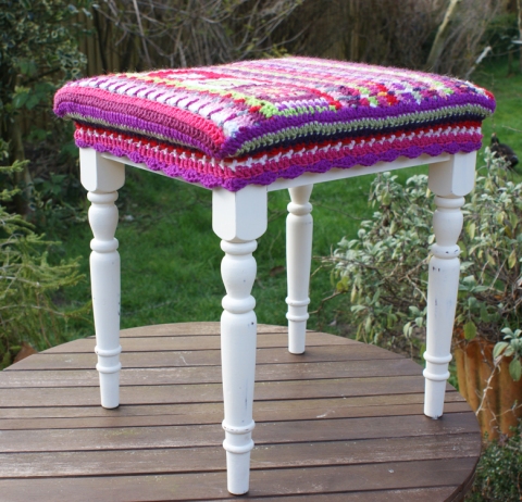 restored footstool with crochet cover